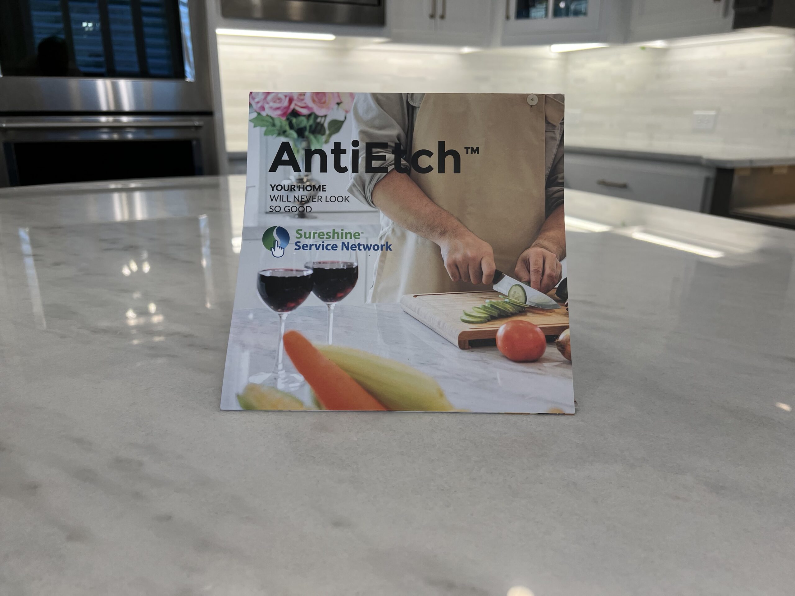 Marble kitchen countertop protected with MORE® AntiEtch®, showing a clean, even finish designed to resist etching and staining from acidic spills while preserving the stone’s natural veining.