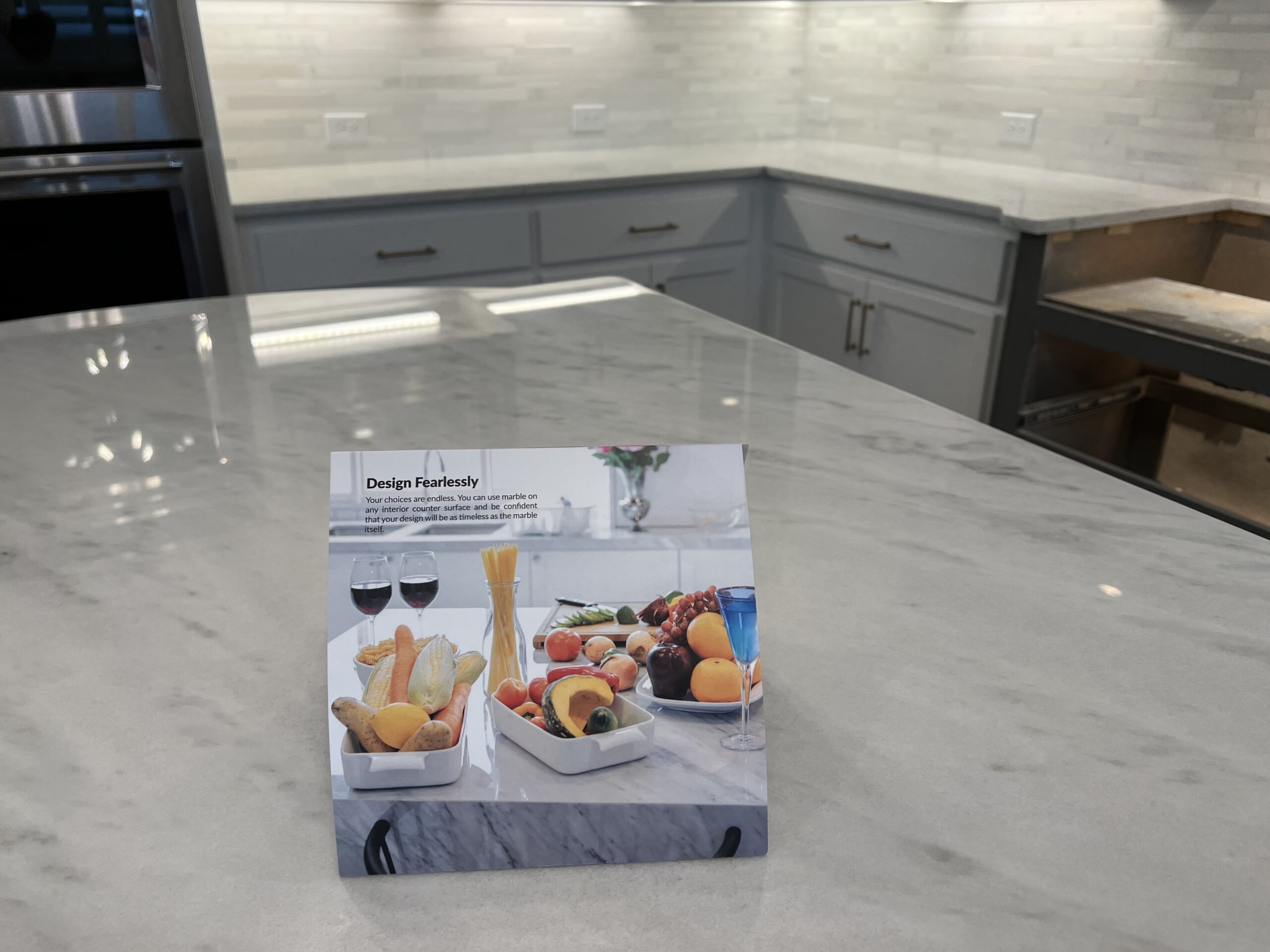 comparison of marble countertop with and without AntiEtch protection Plano TX showing resistance to etching from acidic spills