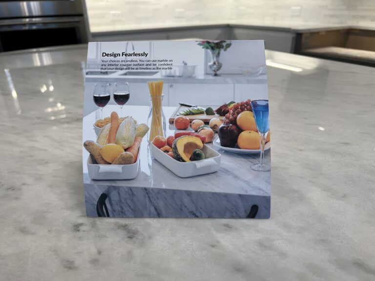 marble kitchen island in Laguna Beach home protected with MORE AntiEtch resisting etching from wine and citrus during entertaining