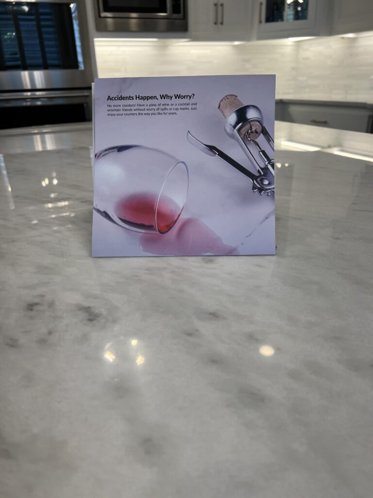 Marble countertop showing dull etch marks caused by acidic foods before restoration in Frisco Texas.
