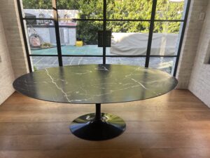 Technician applying MORE® AntiEtch® to a marble kitchen counter in Laguna Beach, CA