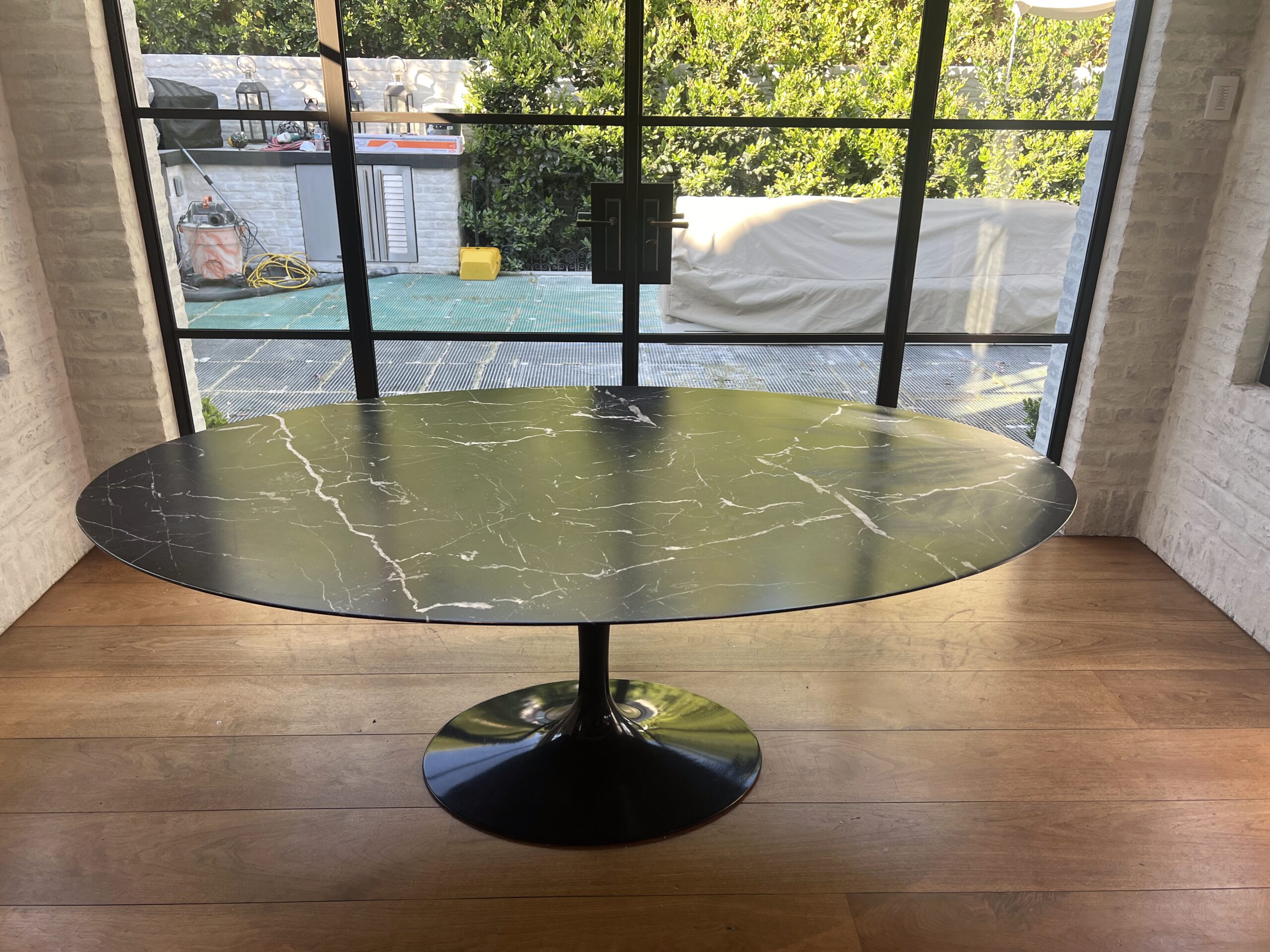 Technician applying MORE® AntiEtch® to a marble kitchen counter in Laguna Beach, CA