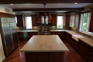 Limestone kitchen countertops refinished to a satin finish and treated with AntiEtch® for superior protection against stains and etches.