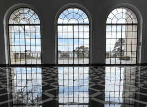 Professionally refinished marble flooring in a Beverly Hills home, showcasing a high-gloss finish and expert craftsmanship.