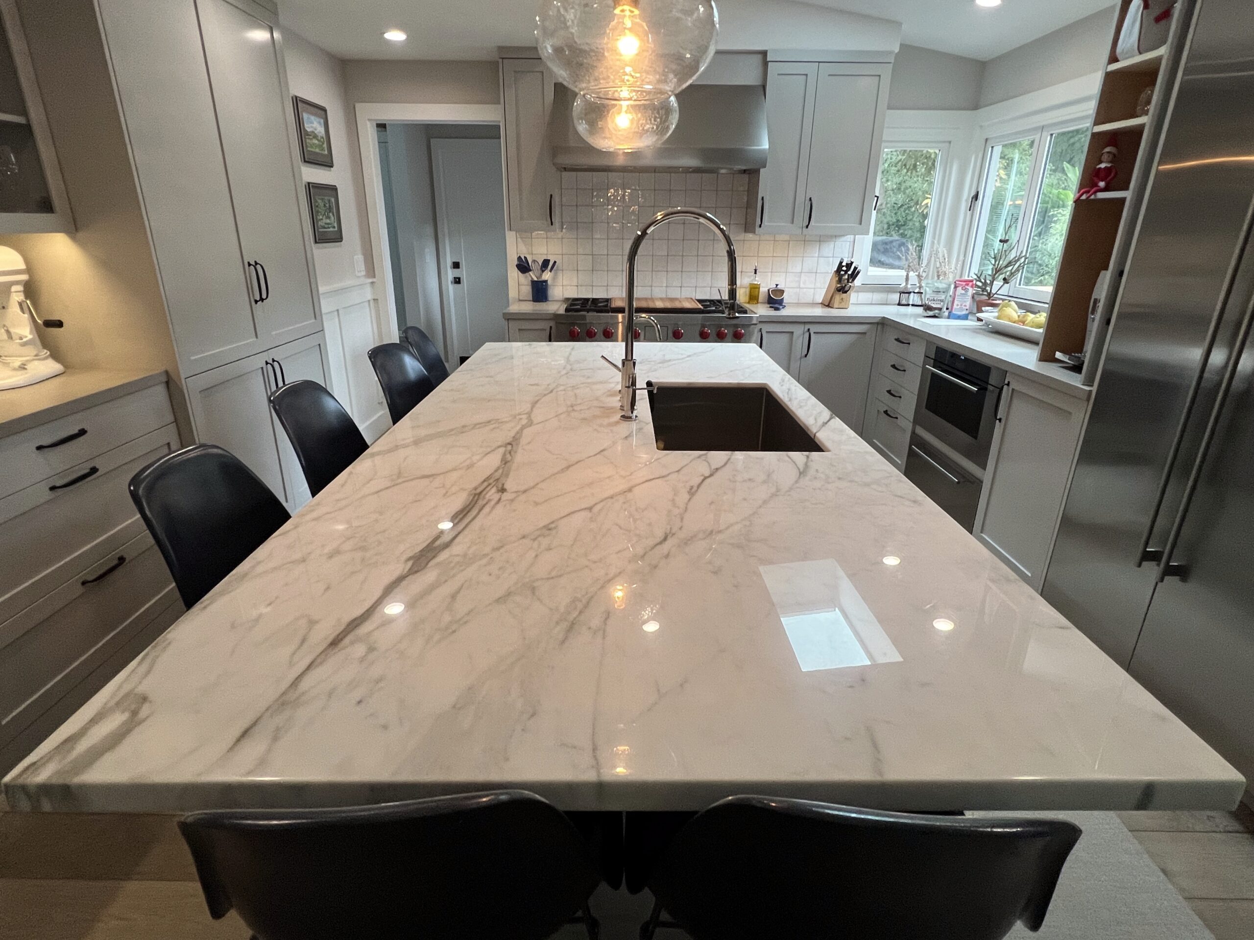 Clear marble countertop in a Dallas kitchen protected with AntiEtch® coating by Sureshine Care and Restoration Services, Inc.
