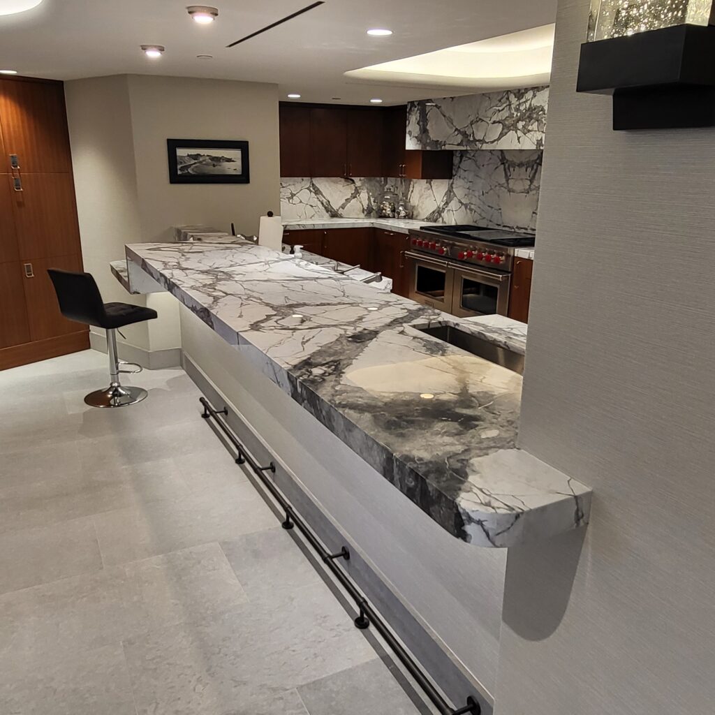 Sureshine technician applying MORE® AntiEtch® to a marble kitchen island in Summerlin, Nevada