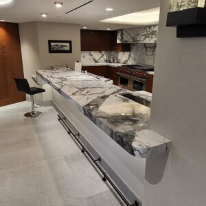 Sureshine technician applying MORE® AntiEtch® to a marble kitchen island in Summerlin, Nevada