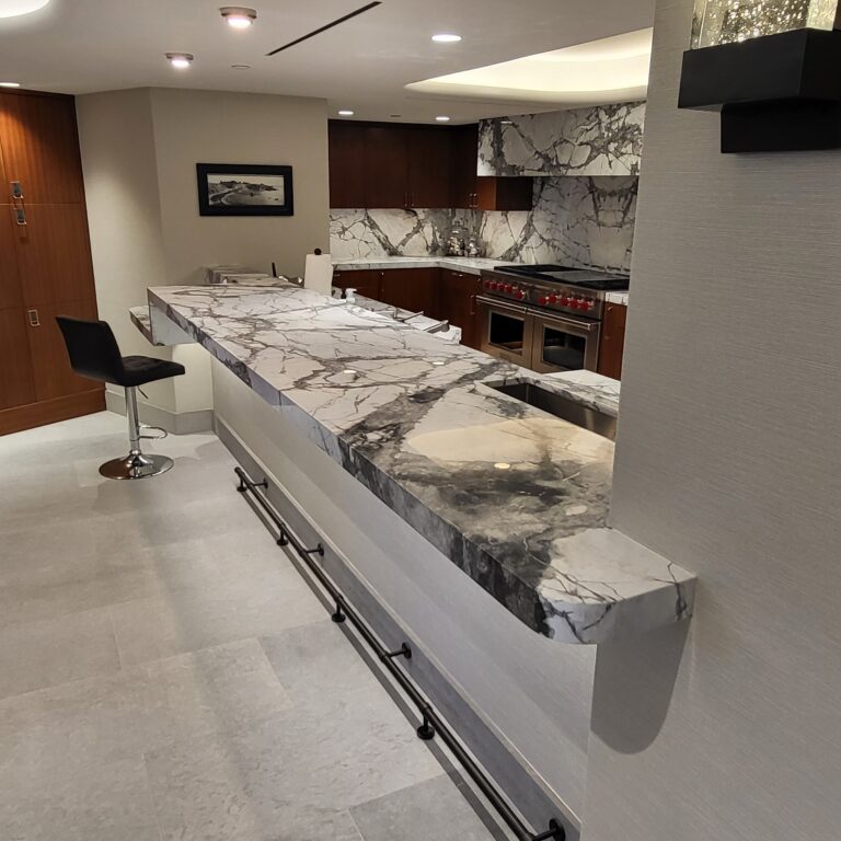 Sureshine technician applying MORE® AntiEtch® to a marble kitchen island in Summerlin, Nevada