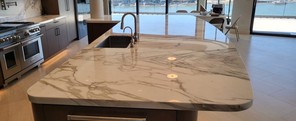 Crystal-clear AntiEtch® coating applied to a marble kitchen countertop in University Park, TX, showing a polished finish and natural veining