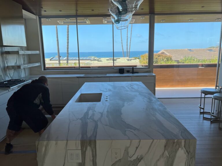 Marble floor in a Pacific Palisades home refinished and polished by Sureshine Care and Restoration Services, Inc., showing restored clarity, smoothness, and reflection.