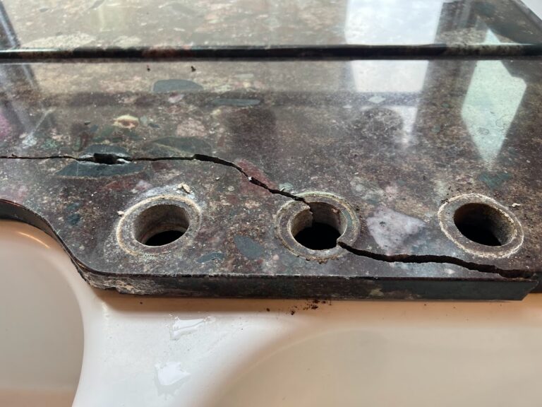 Granite countertop repaired by Sureshine Care and Restoration Services, Inc., showing a smooth, crack-free surface after professional restoration in a Southern California home.