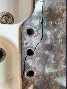 Granite countertop restored by Sureshine Care and Restoration Services, Inc. in a Dallas home, showing a seamless repair and renewed polished finish.