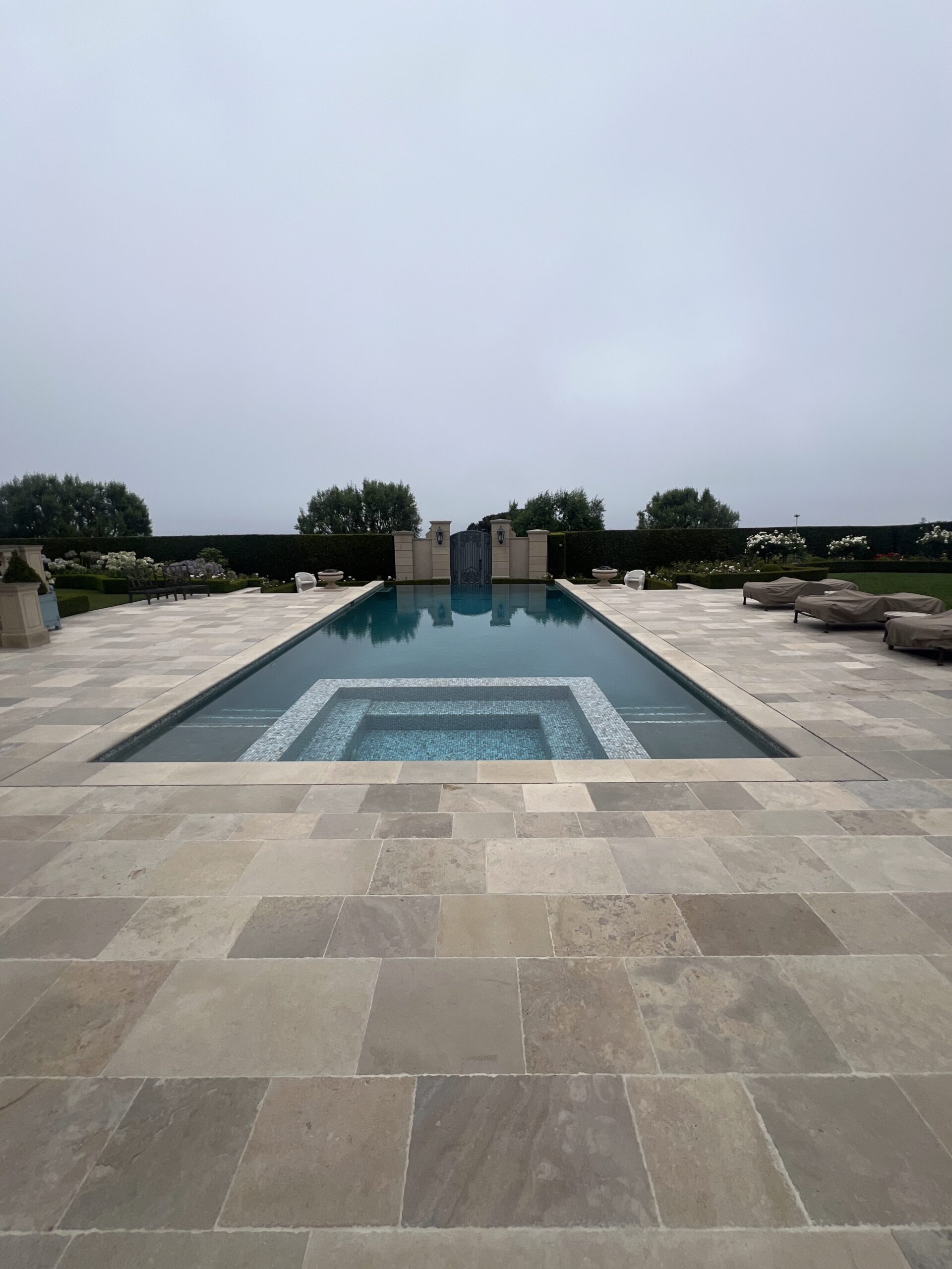 Restored limestone tiles with polished finish in luxury Coto de Caza California home.
