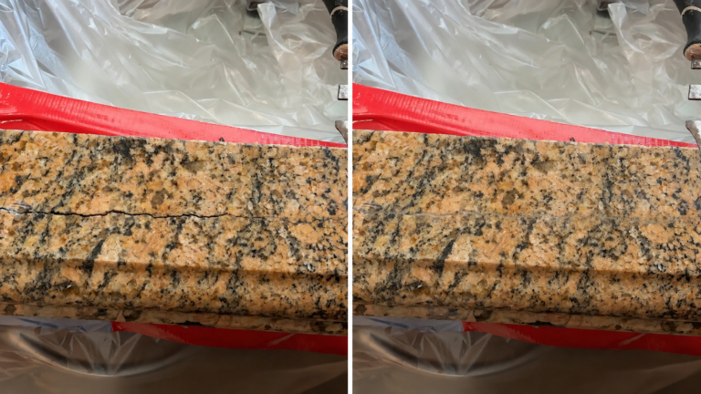 Granite countertop with a structural crack across the front sink rail before professional repair.